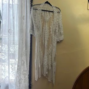 This is a white cardigan.